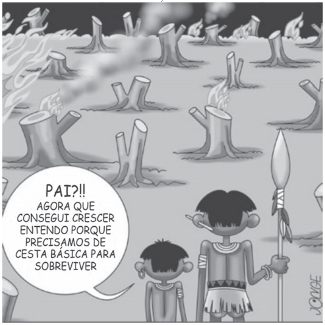 Charge: em uma área de floresta desmatada e queimada, com tocos em chamas e fumaça, um menino indígena diz ao pai, que segura uma lança: "Pai?!! Agora que consegui crescer entendo porque precisamos de cesta básica para sobreviver". Assinatura "Jonge".