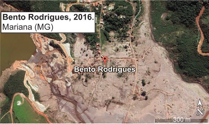 Imagem de satélite: Bento Rodrigues, 2016. Mariana (MG).
Imagem com extensa superfície clara e marrom entre áreas verdes, marcador Bento Rodrigues, seta N e escala de 300 m.