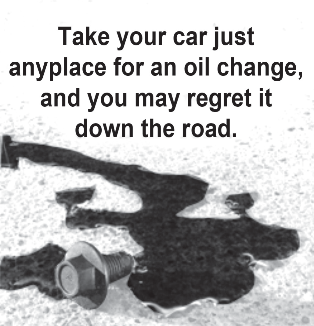 Anúncio em preto e branco. No alto, em letras grandes e negras: “Take your car just anyplace for an oil change, and you may regret it down the road.” Abaixo, fotografia de uma grande poça de óleo escuro espalhada sobre o asfalto claro, com um parafuso de dreno (bujão) caído ao lado da mancha.